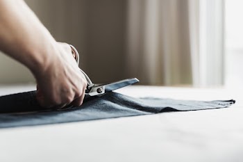 Scissors Cutting Fabric