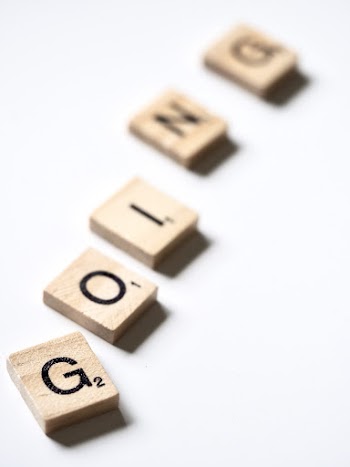 Scrabble Letters Forming the Word Going