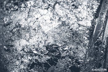 Scraps of silver foil textured background