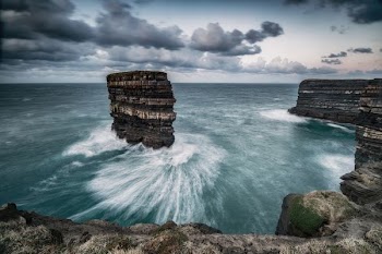sea stack under the cloudy sky