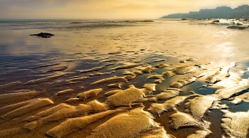 Sea Water On Beachside During Low Tide