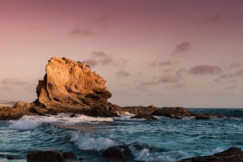 sea waves and boulder