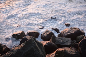 Sea Waves Crashing On Rocks