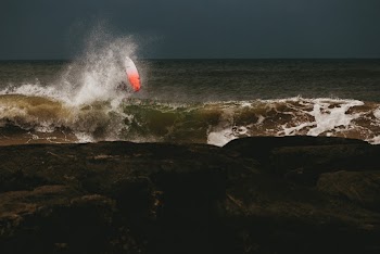 Sea Waves Crashing on Shore Rocks