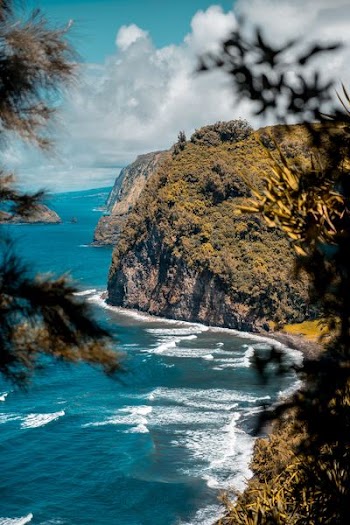 seacliff under nimbus clouds