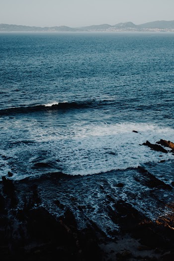 Seascape View With Rocks Near Shore