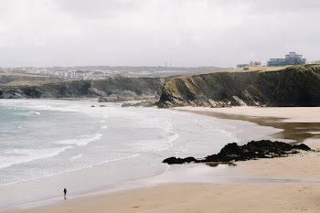 seashore under cloudy sky