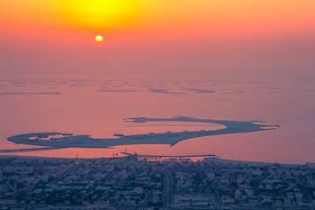 seaside city during sunset