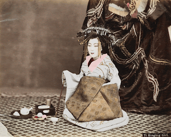seated girl wearing headdress with gold | Free Photo - rawpixel