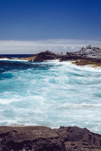 Seawaves Beside Rocks