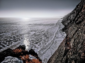 Seawaves on Gray Rock Formation