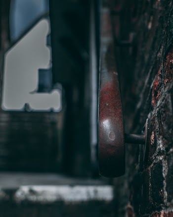 Selective Close-up Photography of Metal Rail