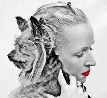 Selective Color Photography of Woman Holding Yorkshire Terrier