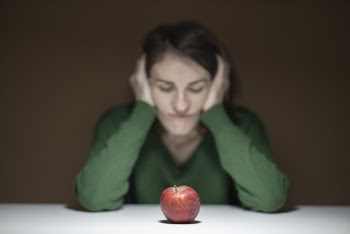 Selective Focus Photo of Apple Fruit on Table