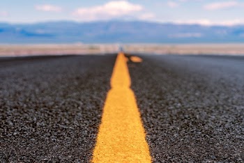 Selective Focus Photo of Asphalt Road