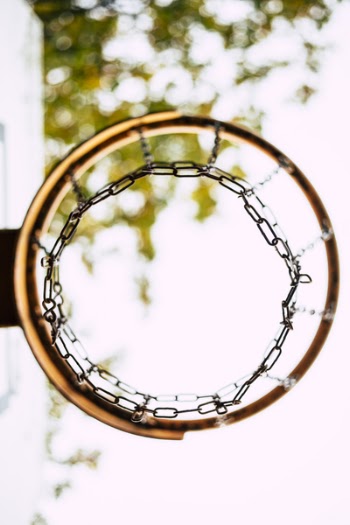 Selective Focus Photo of Basketball Ring