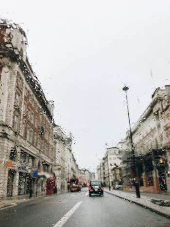 Selective Focus Photo of Black Vehicle on  Street