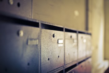 Selective Focus Photo of Black Wooden Drawers
