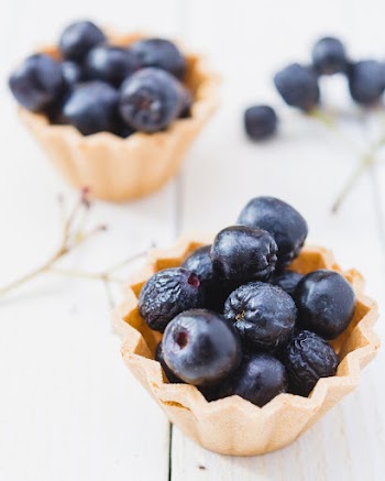 Selective Focus Photo of Blueberries