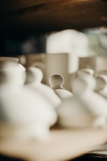 Selective Focus Photo Of Containers