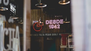 selective focus photo of desdes 1942 neon light signage