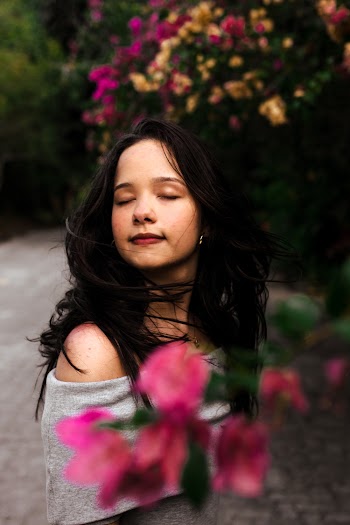 Selective Focus Photo of Girl Posing For Camera