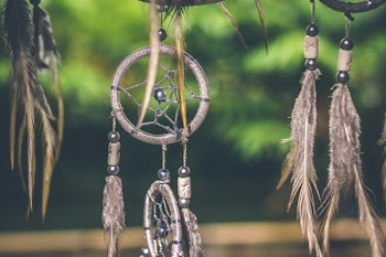 Selective Focus Photo of Gray and Black Dream Catcher