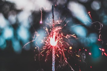 Selective Focus Photo of   Lit Sparkler