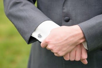 Selective Focus Photo of Man Holding His Hands