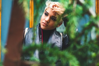 Selective Focus Photo of Man Wearing Black Leather Jacket