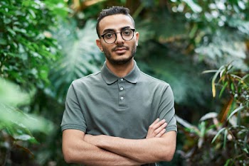 Selective Focus Photo of Man Wearing Eyeglasses and Polo Shirt