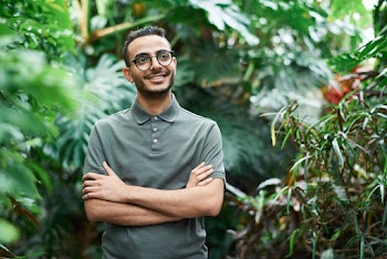 Selective Focus Photo of Man Wearing Eyeglasses and Polo Shirt