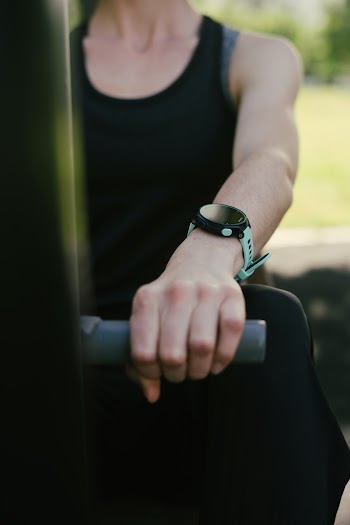 Selective Focus Photo of Person Wearing Wristwatch