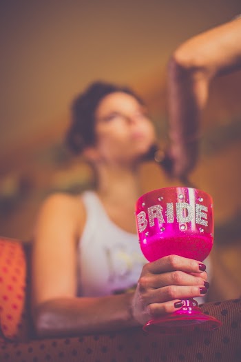 Selective Focus Photo of Pink Bride Goblet