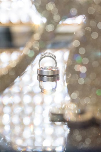 Selective Focus Photo of Silver-colored Clear Gemstone Encrusted Ring