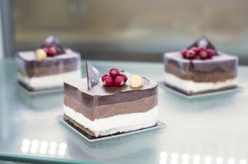 Selective Focus Photo of Sliced Cake on Table
