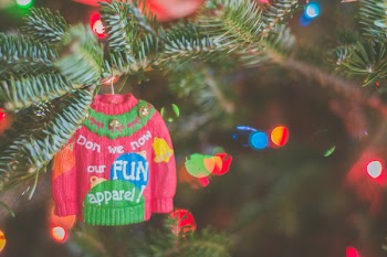 Selective Focus Photo of Sweater Christmas Tree Ornament