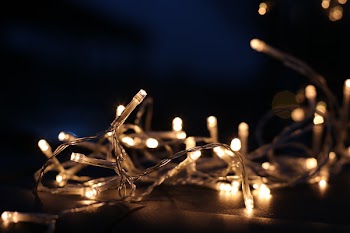 Selective Focus Photo of White and Yellow String Lights