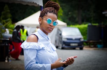 Selective Focus Photo of Woman Holding Android Smartphone