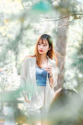 Selective Focus Photo of Woman Posing