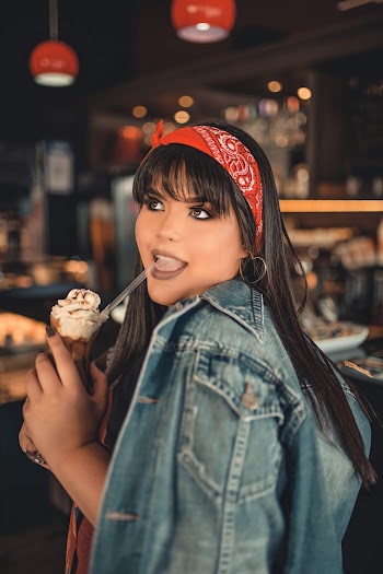 Selective Focus Photo of Woman Posing with a Glass of Frappe Coffee