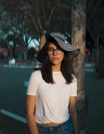 Selective Focus Photo Of Woman Standing Near Tree