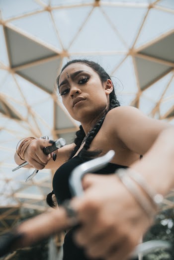 Selective Focus Photo Of Woman Wearing Black Sleeveless Top