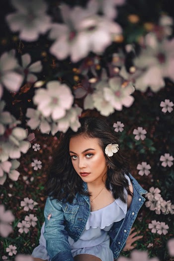 Selective Focus Photo of Woman Wearing Denim Jacket