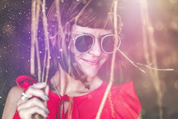 Selective Focus Photo of Woman Wearing Sunglasses
