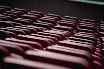 Selective Focus Photograph of Red Oval Shape Equipment