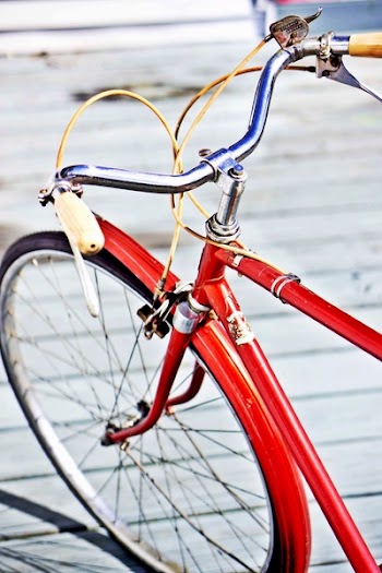 Selective Focus Photograph of Red Rigid Bicycle