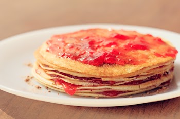 Selective Focus Photograph of Strawberry Jam Crepe Cake