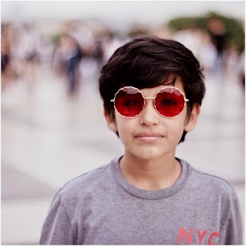 Selective Focus Photography of a Boy in Gray Shirt 