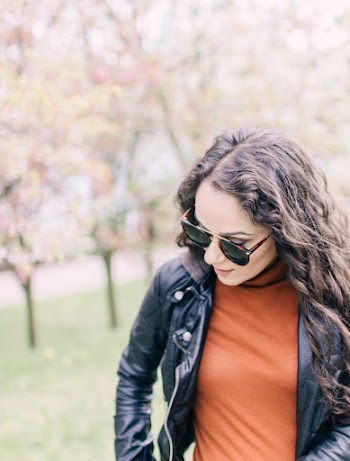 Selective Focus Photography of a Woman Wearing Black Zip-up Jacket